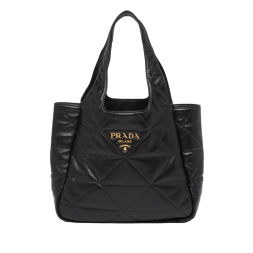 PRADA Nappa Tote Bag. High-End Quality Bag including gift box, care book, dust bag, authenticity card. An unusual triangle motif creates three-dimensional plays on this nappa-leather shopper bag, reinterpreting the iconic Prada shape. Defined by a versatile allure, the style is completed by a magnetic clasp and signature enameled-metal triangle logo. | CRIS AND COCO Authentic Quality Luxury Accessories