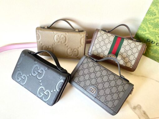 GUCCI Jumbo GG Travel Document Case. Embrace Timeless Luxury: Secure Your Journey with Gucci's Iconic GG Document Case. The iconic GG design makes a comeback for Pre-Fall 2023, adorning a range of small leather items. Paying homage to Guccio Gucci's initials, this motif remains timeless for the brand, showcased prominently in a large size to create a striking logo effect. In this particular case, the emblematic leather defines a travel document holder, ensuring security with a zip closure. | CRIS&COCO Authentic Quality Designer Bags and Luxury Accessories