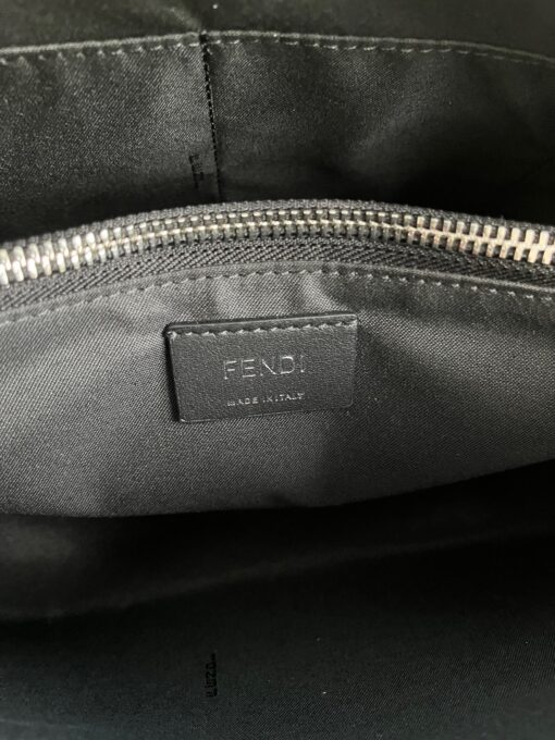 FENDI By The Way- Where Luxury Meets Versatility in Every Detail. Introducing the medium-sized iconic By The Way Boston bag, expertly crafted from luxurious brown leather and adorned with the prestigious "FENDI ROMA" hot-stamp detail, elegantly sealed with a secure zipper closure. This exquisite piece boasts a roomy, impeccably lined interior, complete with a convenient inner pocket featuring a zipper for your precious essentials. The bag's sophistication is further accentuated by its palladium-finish metalware, adding a touch of timeless glamour. Versatility meets style with multiple carrying options, as you can gracefully hold it by the handles, sling it over your shoulder, or even wear it cross-body, thanks to the adjustable and detachable shoulder strap. Elevate your everyday with the By The Way Boston bag, where elegance meets functionality. | CRIS&COCO Authentic Quality Designer Bags and Luxury Accessories