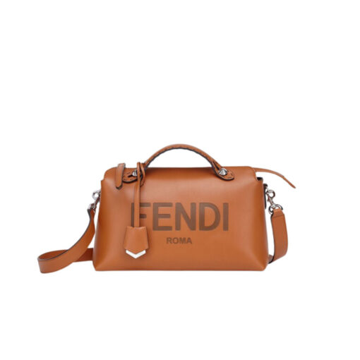 FENDI By The Way- Where Luxury Meets Versatility in Every Detail. Introducing the medium-sized iconic By The Way Boston bag, expertly crafted from luxurious brown leather and adorned with the prestigious "FENDI ROMA" hot-stamp detail, elegantly sealed with a secure zipper closure. This exquisite piece boasts a roomy, impeccably lined interior, complete with a convenient inner pocket featuring a zipper for your precious essentials. The bag's sophistication is further accentuated by its palladium-finish metalware, adding a touch of timeless glamour. Versatility meets style with multiple carrying options, as you can gracefully hold it by the handles, sling it over your shoulder, or even wear it cross-body, thanks to the adjustable and detachable shoulder strap. Elevate your everyday with the By The Way Boston bag, where elegance meets functionality. | CRIS&COCO Authentic Quality Designer Bags and Luxury Accessories