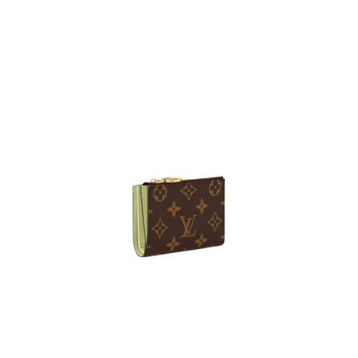 Lisa Wallet: Elevate Your Everyday with Effortless Elegance. The Lisa wallet showcases an exquisite blend of Monogram canvas adorned with a vibrant leather lining, making it a true testament to luxury and style. Designed with convenience in mind, this compact wallet effortlessly nestles into even the tiniest of bags or clutches, rendering it both practical and chic. What sets this wallet apart is its thoughtfully crafted gusseted coin pocket, embellished with the iconic LV Circle charm on the zipper pull. Delving further within, you'll discover a well-appointed interior featuring a spacious bill compartment, two versatile flat pockets, and four impeccably designed card slots. It's not just a wallet; it's a testament to the artistry of fashion and functionality. | CRIS&COCO Authentic Quality Designer Bags and Luxury Accessories