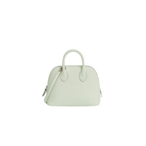 Bolide 1923 Mini. Timeless Elegance, Unparalleled Convenience: The Bolide Bag – A Journey in Every Stitch. Created in 1923 with the discerning needs of elite drivers and seasoned long-distance travelers in mind, this globe-trotting bag effortlessly finds its place within any automobile trunk. Its iconic round-angled shape owes its origins to the zip fastener, a novel invention introduced to France by Émile Hermès in the late 1910s, and this innovative feature enables swift access to its contents. The Bolide bag is available in various sizes, including a travel-sized version, and a range of handbag options, offering both style and functionality to its fortunate owners.
