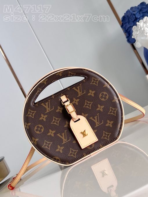 LOUIS VUITTON Around Me PM: Elegance in Every Circle. Crafted from Monogram-coated canvas, the Around Me bag draws inspiration from the House’s LV Circle signature, an emblem featured on Louis Vuitton storefronts and advertising since the 1920s. Debuted at the Spring-Summer 2024 Show, this perfectly circular bag boasts integrated handles, offering a minimalistic yet elegant appeal. Its petite size adds a touch of charming style.