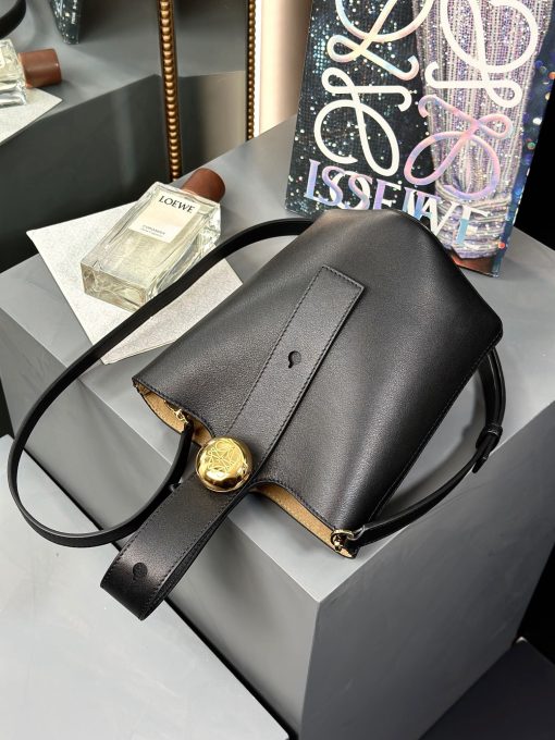 LOEWE Pebble Bucket Mini bag in soft grained calfskin with adjustable Anagram Pebble strap.