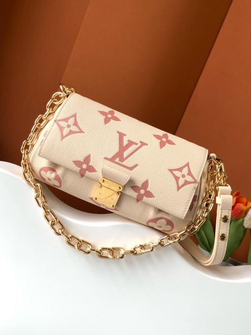 LOUIS VUITTON Favorite: Effortlessly Chic, Versatile Style. Meet The Favorite—a stunning blend of elegance and versatility. Crafted from soft, grained leather adorned with a bold oversized embossed Monogram pattern, this bag is the epitome of chic style. Feminine pleats add a couture-inspired touch, while the gold-tone magnetic lock pays homage to the Maison's storied heritage. With its removable and adjustable strap, The Favorite offers multiple ways to wear: short-shoulder or cross-body for day, and a detachable gold-tone chain for a glamorous evening look. Effortlessly stylish and endlessly adaptable, The Favorite is the perfect accessory for every occasion.