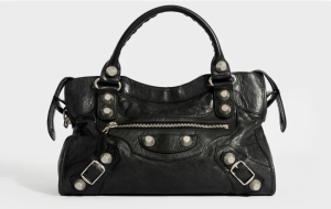 A black BALENCIAGA City Bag with signature hardware and slouchy design.