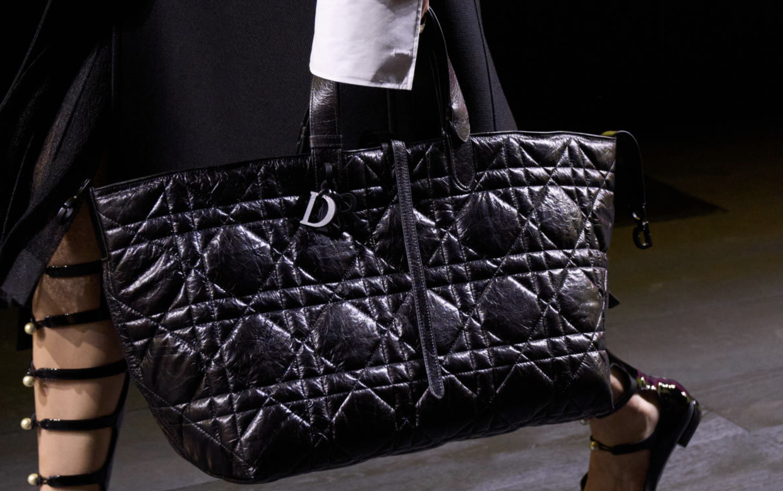 A luxury tote used in a fashion runway.