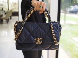 A stunning PRADA Affair: Featuring the new CHANEL 19 Flap Bag in a chic city setting.