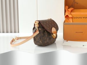 Sunset Handbag. Authentic quality luxury bag crafted in genuine leather comes with authenticity card, dust bag and gift bag. Timeless Elegance, Effortless Versatility. Lovers of the iconic Sunset handbag will be enchanted by this new edition in timeless Monogram coated canvas. Its vintage-inspired silhouette is elegantly accented with smooth leather and refined gold-toned hardware, including a signature tuck lock. Designed for versatility, it can be worn cross-body with the additional leather strap, styled over the shoulder, or carried gracefully by hand. Spacious enough to hold daily essentials, including a long wallet, this piece seamlessly blends classic charm with modern practicality. - CRIS&COCO Sunset Handbag. Authentic quality luxury bag crafted in genuine leather comes with authenticity card, dust bag and gift bag. Timeless Elegance, Effortless Versatility. Lovers of the iconic Sunset handbag will be enchanted by this new edition in timeless Monogram coated canvas. Its vintage-inspired silhouette is elegantly accented with smooth leather and refined gold-toned hardware, including a signature tuck lock. Designed for versatility, it can be worn cross-body with the additional leather strap, styled over the shoulder, or carried gracefully by hand. Spacious enough to hold daily essentials, including a long wallet, this piece seamlessly blends classic charm with modern practicality.