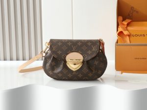 Sunset Handbag. Authentic quality luxury bag crafted in genuine leather comes with authenticity card, dust bag and gift bag. Timeless Elegance, Effortless Versatility. Lovers of the iconic Sunset handbag will be enchanted by this new edition in timeless Monogram coated canvas. Its vintage-inspired silhouette is elegantly accented with smooth leather and refined gold-toned hardware, including a signature tuck lock. Designed for versatility, it can be worn cross-body with the additional leather strap, styled over the shoulder, or carried gracefully by hand. Spacious enough to hold daily essentials, including a long wallet, this piece seamlessly blends classic charm with modern practicality. - CRIS&COCO Sunset Handbag. Authentic quality luxury bag crafted in genuine leather comes with authenticity card, dust bag and gift bag. Timeless Elegance, Effortless Versatility. Lovers of the iconic Sunset handbag will be enchanted by this new edition in timeless Monogram coated canvas. Its vintage-inspired silhouette is elegantly accented with smooth leather and refined gold-toned hardware, including a signature tuck lock. Designed for versatility, it can be worn cross-body with the additional leather strap, styled over the shoulder, or carried gracefully by hand. Spacious enough to hold daily essentials, including a long wallet, this piece seamlessly blends classic charm with modern practicality.