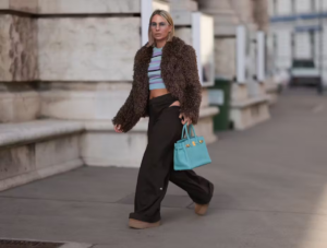 A viral meme featuring a GUCCI bag with the text "1 BR Apartment or This?
