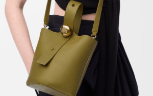 A clean, minimalist product shot of the Mini Pebble Bucket Bag by Cris & Coco