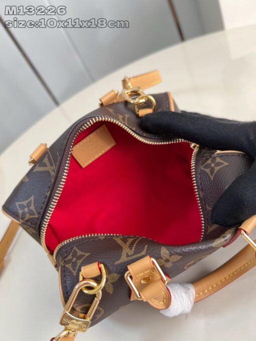 Nano Speedy Dating. Authentic quality luxury bag crafted in genuine leather comes with authenticity card, dust bag and gift bag. Love at First Carry — Your Valentine’s Day Crush. Meet the Nano Speedy Dating—a limited-edition charmer made for Valentine’s Day. Designed to spark instant love, this mini bag is crafted from LV’s iconic Monogram coated canvas, accented with rich cowhide leather and gleaming gold-tone hardware. Its playful silhouette holds just the essentials, perfect for a romantic day out or a stylish everyday moment. Whether worn cross-body or carried by hand, the Nano Speedy Dating is the sweetest way to say je t’aime—to someone special or yourself.