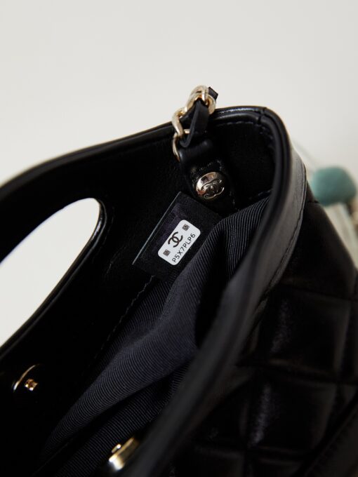 31 Nano Shopping Bag. Authentic quality luxury bag crafted in genuine leather comes with authenticity card, dust bag and gift bag. Small in size, grand in statement.  A miniature marvel that captures the sophistication of *ANEL in its most playful form. Crafted with meticulous precision, this petite icon merges the timeless spirit of the *ANEL 31 with a modern twist on everyday elegance. Designed in supple lambskin and finished with gleaming gold-tone hardware, the Nano 31 doesn’t just carry your essentials — it carries your attitude. Whether worn crossbody, by hand, or dangling from the crook of your arm, this charming piece elevates every ensemble with a whisper of Parisian chic. Perfect for a night out or a day in the spotlight, it’s not just a bag — it’s your boldest accessory in its most compact form. Because luxury doesn't need to shout. Sometimes, it just needs to charm.