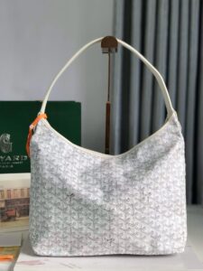 Bohème Hobo Bag. Authentic quality luxury bag crafted in genuine leather comes with authenticity card, dust bag and gift bag. Wander Freely. Carry Elegantly. Introducing the Goyard Bohème Hobo Bag—a tribute to Parisian spirit and wanderlust. Inspired by the timber raftsmen’s humble travel pouches, this bag blends heritage storytelling with everyday luxury. Crafted to be exceptionally lightweight and flexible, it drapes effortlessly on your shoulder with a wide, comfortable handle designed for long city strolls or spontaneous weekend escapes. Its beauty lies not only in its sleek silhouette but also in its thoughtful functionality. The secure zip closure keeps your essentials safe, while the removable snap-fastened pouch doubles as a chic clutch or wallet—perfect for a quick dash or stylish switch-up. Whether you’re wandering through cobblestone streets or navigating your daily routine, the Bohème ensures your essentials are always within reach. This is not just a bag—it’s your elegant partner in carefree adventures. - CRIS&COCO Bohème Hobo Bag. Authentic quality luxury bag crafted in genuine leather comes with authenticity card, dust bag and gift bag. Wander Freely. Carry Elegantly. Introducing the Goyard Bohème Hobo Bag—a tribute to Parisian spirit and wanderlust. Inspired by the timber raftsmen’s humble travel pouches, this bag blends heritage storytelling with everyday luxury. Crafted to be exceptionally lightweight and flexible, it drapes effortlessly on your shoulder with a wide, comfortable handle designed for long city strolls or spontaneous weekend escapes. Its beauty lies not only in its sleek silhouette but also in its thoughtful functionality. The secure zip closure keeps your essentials safe, while the removable snap-fastened pouch doubles as a chic clutch or wallet—perfect for a quick dash or stylish switch-up. Whether you’re wandering through cobblestone streets or navigating your daily routine, the Bohème ensures your essentials are always within reach. This is not just a bag—it’s your elegant partner in carefree adventures.