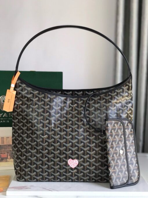 Bohème Hobo Bag. Authentic quality luxury bag crafted in genuine leather comes with authenticity card, dust bag and gift bag. Wander Freely. Carry Elegantly. Introducing the Goyard Bohème Hobo Bag—a tribute to Parisian spirit and wanderlust. Inspired by the timber raftsmen’s humble travel pouches, this bag blends heritage storytelling with everyday luxury. Crafted to be exceptionally lightweight and flexible, it drapes effortlessly on your shoulder with a wide, comfortable handle designed for long city strolls or spontaneous weekend escapes. Its beauty lies not only in its sleek silhouette but also in its thoughtful functionality. The secure zip closure keeps your essentials safe, while the removable snap-fastened pouch doubles as a chic clutch or wallet—perfect for a quick dash or stylish switch-up. Whether you’re wandering through cobblestone streets or navigating your daily routine, the Bohème ensures your essentials are always within reach. This is not just a bag—it’s your elegant partner in carefree adventures.