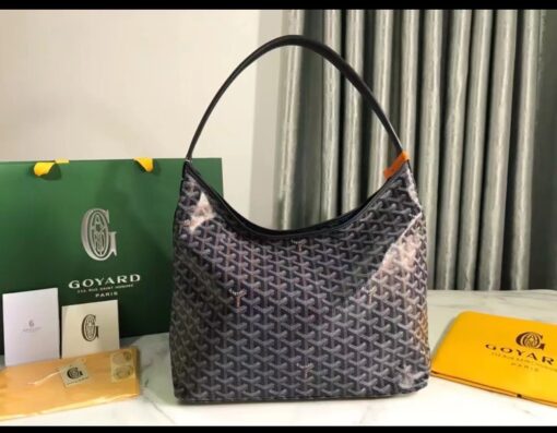 Bohème Hobo Bag. Authentic quality luxury bag crafted in genuine leather comes with authenticity card, dust bag and gift bag. Wander Freely. Carry Elegantly. Introducing the Goyard Bohème Hobo Bag—a tribute to Parisian spirit and wanderlust. Inspired by the timber raftsmen’s humble travel pouches, this bag blends heritage storytelling with everyday luxury. Crafted to be exceptionally lightweight and flexible, it drapes effortlessly on your shoulder with a wide, comfortable handle designed for long city strolls or spontaneous weekend escapes. Its beauty lies not only in its sleek silhouette but also in its thoughtful functionality. The secure zip closure keeps your essentials safe, while the removable snap-fastened pouch doubles as a chic clutch or wallet—perfect for a quick dash or stylish switch-up. Whether you’re wandering through cobblestone streets or navigating your daily routine, the Bohème ensures your essentials are always within reach. This is not just a bag—it’s your elegant partner in carefree adventures.