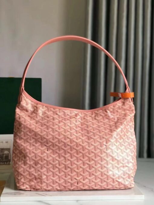 Bohème Hobo Bag. Authentic quality luxury bag crafted in genuine leather comes with authenticity card, dust bag and gift bag. Wander Freely. Carry Elegantly. Introducing the Goyard Bohème Hobo Bag—a tribute to Parisian spirit and wanderlust. Inspired by the timber raftsmen’s humble travel pouches, this bag blends heritage storytelling with everyday luxury. Crafted to be exceptionally lightweight and flexible, it drapes effortlessly on your shoulder with a wide, comfortable handle designed for long city strolls or spontaneous weekend escapes. Its beauty lies not only in its sleek silhouette but also in its thoughtful functionality. The secure zip closure keeps your essentials safe, while the removable snap-fastened pouch doubles as a chic clutch or wallet—perfect for a quick dash or stylish switch-up. Whether you’re wandering through cobblestone streets or navigating your daily routine, the Bohème ensures your essentials are always within reach. This is not just a bag—it’s your elegant partner in carefree adventures.