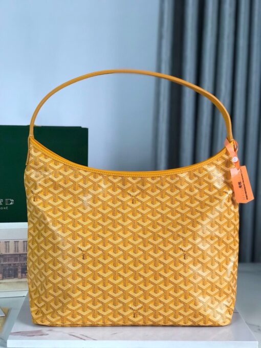 Bohème Hobo Bag. Authentic quality luxury bag crafted in genuine leather comes with authenticity card, dust bag and gift bag. Wander Freely. Carry Elegantly. Introducing the Goyard Bohème Hobo Bag—a tribute to Parisian spirit and wanderlust. Inspired by the timber raftsmen’s humble travel pouches, this bag blends heritage storytelling with everyday luxury. Crafted to be exceptionally lightweight and flexible, it drapes effortlessly on your shoulder with a wide, comfortable handle designed for long city strolls or spontaneous weekend escapes. Its beauty lies not only in its sleek silhouette but also in its thoughtful functionality. The secure zip closure keeps your essentials safe, while the removable snap-fastened pouch doubles as a chic clutch or wallet—perfect for a quick dash or stylish switch-up. Whether you’re wandering through cobblestone streets or navigating your daily routine, the Bohème ensures your essentials are always within reach. This is not just a bag—it’s your elegant partner in carefree adventures.