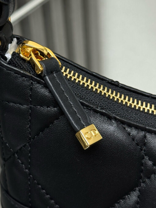 Cigale Mini Bag. Authentic quality luxury bag crafted in genuine leather comes with authenticity card, dust bag and gift bag. A Contemporary Classic in the Making. Meet the latest gem in the Miss Caro line: the *ior Cigale Mini Bag—a sleek, structured piece that blends timeless elegance with modern attitude. Crafted in supple lambskin and elevated by bold Macrocannage topstitching, this petite powerhouse exudes refined femininity from every angle. The standout tonal strap, adorned with an antique gold-finish CD signature, adds a sculptural touch to its streamlined silhouette. A secure zip compartment keeps your essentials close, while the adjustable leather strap offers effortless over-the-shoulder chic. Lightweight, luxurious, and unmistakably *ior—this is the mini bag that delivers big on style. Miss Caro’s modern muse has arrived.