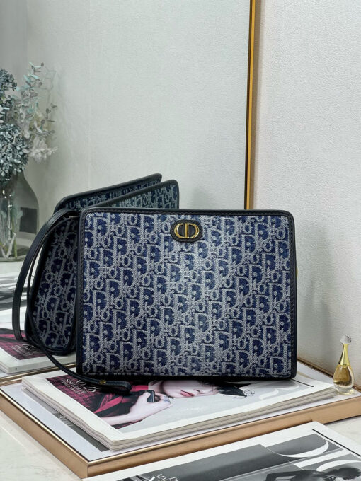30 Montaigne Dea Pouch. Authentic quality luxury bag crafted in genuine leather comes with authenticity card, dust bag and gift bag. Effortless Elegance, Perfectly Packaged. Elevate your everyday with the 30 Montaigne Dea pouch- where timeless Dior heritage meets modern utility.Expertly crafted in iconic *ior Oblique jacquard and finished with the elegant CD signature, this pouch is more than just an accessory — it’s a statement. Its spacious interior offers room for your essentials, while the structured silhouette transitions effortlessly from clutch to organizer within your *ior Book Tote. Whether carried solo or nested in your favorite bag, the Dea pouch is your answer to understated sophistication with unmistakable style.