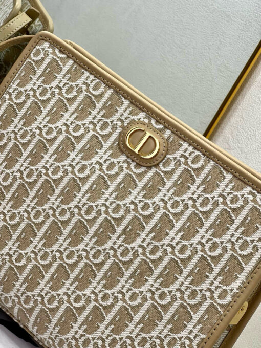 30 Montaigne Dea Pouch. Authentic quality luxury bag crafted in genuine leather comes with authenticity card, dust bag and gift bag. Effortless Elegance, Perfectly Packaged. Elevate your everyday with the 30 Montaigne Dea pouch- where timeless Dior heritage meets modern utility.Expertly crafted in iconic *ior Oblique jacquard and finished with the elegant CD signature, this pouch is more than just an accessory — it’s a statement. Its spacious interior offers room for your essentials, while the structured silhouette transitions effortlessly from clutch to organizer within your *ior Book Tote. Whether carried solo or nested in your favorite bag, the Dea pouch is your answer to understated sophistication with unmistakable style.