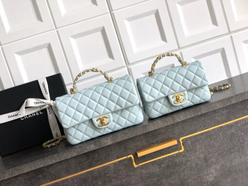 Mini Handy CC Flap Bag. Authentic quality luxury bag crafted in genuine leather comes with authenticity card, dust bag and gift bag. Petite yet powerful, the Caviar Quilted Mini Handy CC Flap embodies timeless sophistication. Crafted from signature caviar leather with classic diamond quilting, this bag exudes refined elegance in every stitch. The design features a structured top handle and a leather-threaded chain strap, offering versatile styling from hand-carry to crossbody. Gold-plated CC details and the signature turn-lock closure add the perfect touch of luxury. Inside, a sleek leather interior with both zipper and patch pockets ensures your essentials stay beautifully organized. Compact, iconic, and unmistakably *ANEL — this is the ultimate statement in modern classic style.