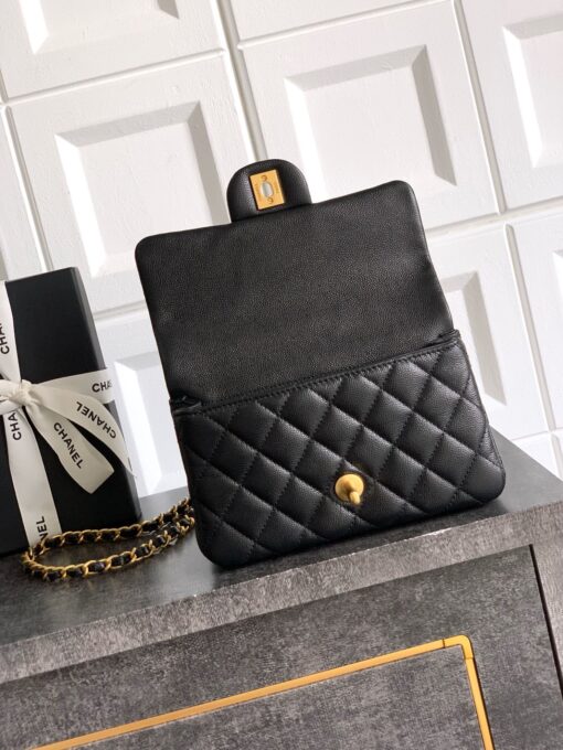 Mini Handy CC Flap Bag. Authentic quality luxury bag crafted in genuine leather comes with authenticity card, dust bag and gift bag. Petite yet powerful, the Caviar Quilted Mini Handy CC Flap embodies timeless sophistication. Crafted from signature caviar leather with classic diamond quilting, this bag exudes refined elegance in every stitch. The design features a structured top handle and a leather-threaded chain strap, offering versatile styling from hand-carry to crossbody. Gold-plated CC details and the signature turn-lock closure add the perfect touch of luxury. Inside, a sleek leather interior with both zipper and patch pockets ensures your essentials stay beautifully organized. Compact, iconic, and unmistakably *ANEL — this is the ultimate statement in modern classic style.