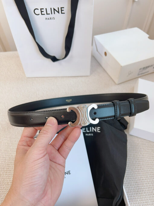 Border Triomphe Belt. Authentic quality luxury bag crafted in genuine leather comes with authenticity card, dust bag and gift bag. Where Parisian Precision Meets Effortless Elegance. The Border Triomphe Belt embodies Parisian refinement in its purest form. Crafted from luxurious smooth calfskin, this elegant accessory is framed by subtle contrasting borders that highlight its sleek lines and meticulous craftsmanship. At its center, the iconic Triomphe buckle—an emblem of *ELINE’s timeless heritage—adds a touch of golden sophistication. Whether paired with tailored trousers, a flowing dress, or high-waisted denim, this belt transforms any outfit into a statement of effortless elegance. A true symbol of quiet luxury, the Border Triomphe Belt is the ultimate finishing touch for those who appreciate understated glamour and modern French allure.