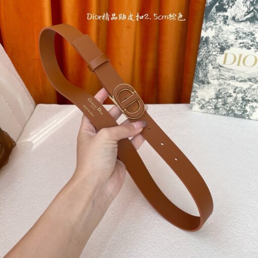 30 Montaigne Belt. Authentic quality luxury belt crafted in genuine leather comes with authenticity card, dust bag and gift bag. Elevate Every Look! Inspired by the iconic 30 Montaigne bag, this belt is a refined expression of *ior’s timeless craftsmanship. Crafted in smooth brown calfskin, it’s enriched with a gleaming CD buckle in antique gold-finish metal—an instantly recognizable emblem of the House. Sleek yet versatile, its design pairs effortlessly with jeans, skirts, or dresses, making it a wardrobe essential that transitions from day to evening with ease. More than just an accessory, the 30 Montaigne belt is a statement of elegance, sophistication, and unmistakable *ior heritage.